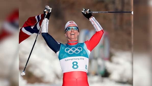 Winter Olympics 2018: Marit Bjoergen wins women's 30 km cross-country title, becomes only five-medal athlete at Pyeongchang