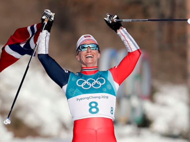 Winter Olympics 2018: Marit Bjoergen wins women's 30 km cross-country title, becomes only five-medal athlete at Pyeongchang