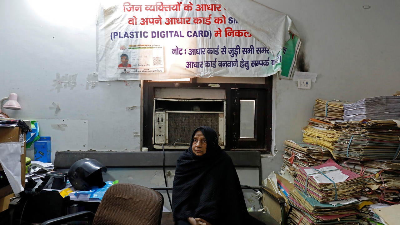 A woman waits for her turn to to enrol for the Unique Identification (UID) database system, Aadhaar, at a registration centre in New Delhi, India. Image: Reuters