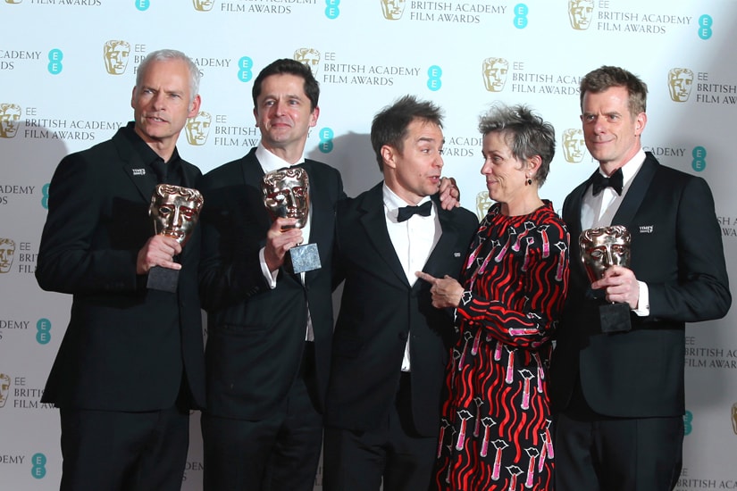 Director Martin McDonagh, from left, producer Peter Czernin, actors Sam Rockwell, Frances McDormand and producer Graham Broadbent pose for photographers backstage with their Best Film awards for 'Three Billboards Outside Ebbing, Missouri' at the BAFTA 2018 Awards in London. AP
