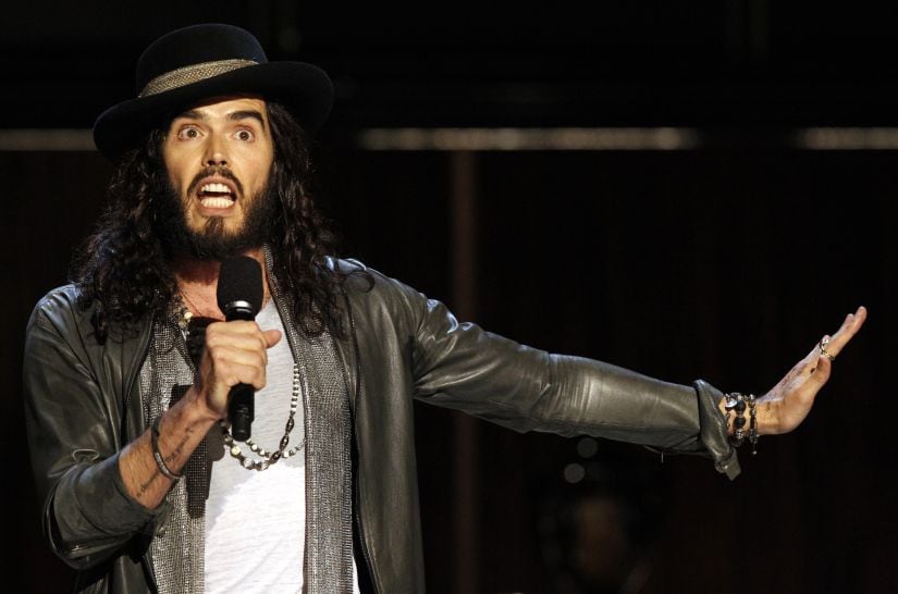 Actor and comedian Russell Brand speaks during the taping of the Spike TV special tribute "Eddie Murphy: One Night Only" at the Saban theatre in Beverly Hills, California November 3, 2012. The program airs November 14. REUTERS/Mario Anzuoni (UNITED STATES - Tags: ENTERTAINMENT) - GM1E8B419SL01