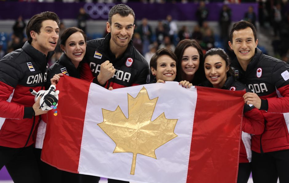 Canada's team celebrate after winning gold in the Team Event Ice Dance Free Dance competition of figure skating. Reuters Canada's team celebrate after winning gold in the Team Event Ice Dance Free Dance competition of figure skating. Reuters