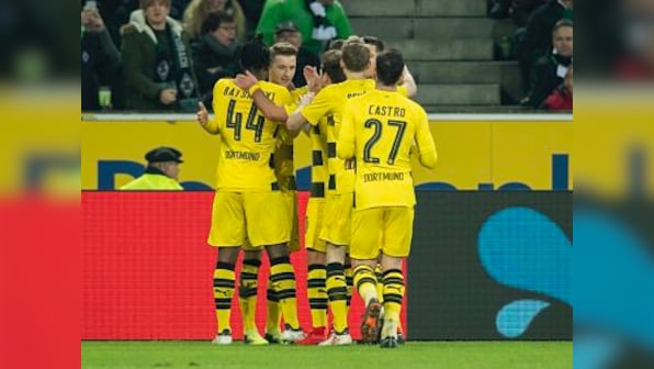 Bundesliga: Marco Reus' solitary goal helps Borussia Dortmund beat Moenchengladbach on atrocious pitch