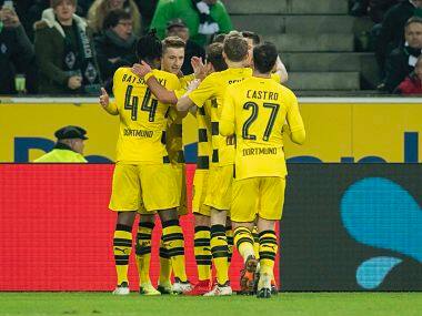 Bundesliga: Marco Reus' solitary goal helps Borussia Dortmund beat Moenchengladbach on atrocious pitch