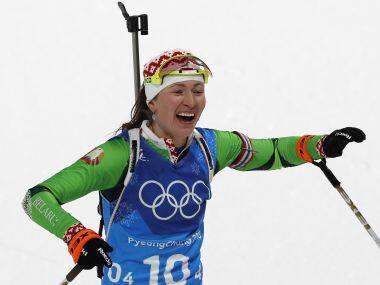 Winter Olympics 2018: Former KGB agent Darya Domracheva wins biathlon gold medal for Belarus