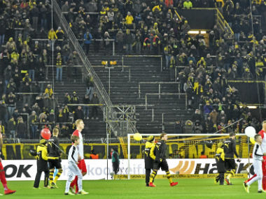 Bundesliga: Borussia Dortmund held by Augsburg as fans boycott match to protest against Monday football Bundesliga: Borussia Dortmund held by Augsburg as fans boycott match to protest against Monday football