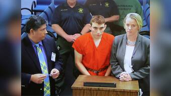 Accused Nikolas Cruz confesses to Florida school shooting, says he discarded rifle to blend in with crowd fleeing campus
