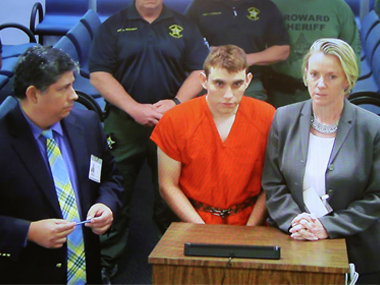 Accused Nikolas Cruz confesses to Florida school shooting, says he discarded rifle to blend in with crowd fleeing campus Accused Nikolas Cruz confesses to Florida school shooting, says he discarded rifle to blend in with crowd fleeing campus