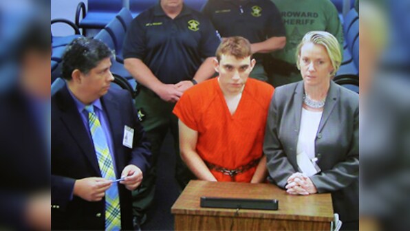 Accused Nikolas Cruz confesses to Florida school shooting, says he discarded rifle to blend in with crowd fleeing campus
