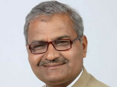 BJP MP from Madhya Pradesh Janardan Mishra cleans toilet with bare hands at school in Rewa district BJP MP from Madhya Pradesh Janardan Mishra cleans toilet with bare hands at school in Rewa district