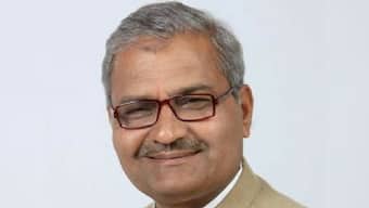 BJP MP from Madhya Pradesh Janardan Mishra cleans toilet with bare hands at school in Rewa district