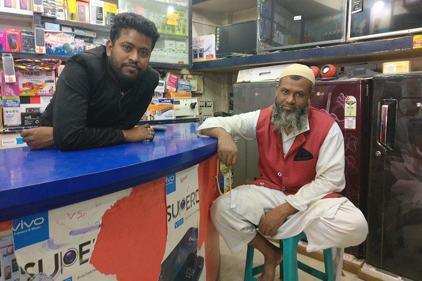 Mohammed Jubbar Ali and his son Mohammed A Islam, residents of Phulbari. Firspost/Rishiraj Bhagawati