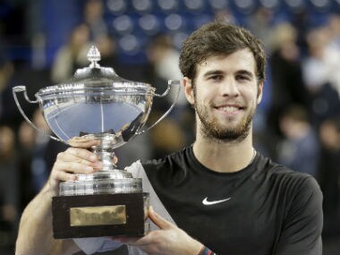 Karen Khachanov of Russia holds his trophy after defeating Lucas Pouille in Marseille. AP