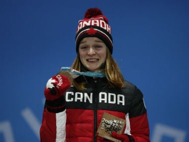 Bronze medallst Kim Boutin of Canada reacts on the podium. Reuters
