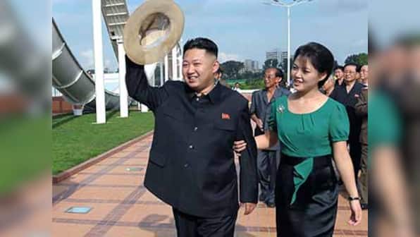 Kim Jong-un tries to soften authoritarian image by sharing stage with wife, sister