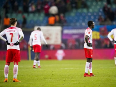 RB Leipzig players react after losing to Cologne. AFP