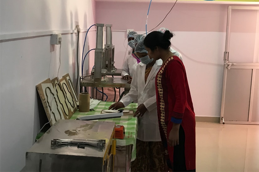 Maya Vishwakarma with women workers at the production centre in Madhya Pradesh.