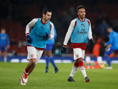 Arsenal's Henrikh Mkhitaryan and Pierre-Emerick Aubameyang warm up. Reuters