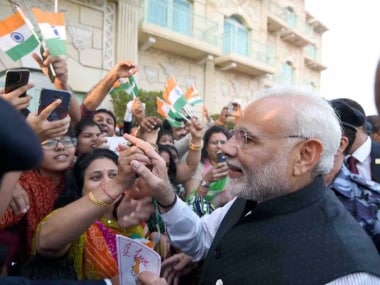 Muscat: Prime Minister Narendra Modi meets Indian community people who enthusiastically welcomed him in Muscat, Oman on Sunday. PTI Photo/PIB (PTI2_11_2018_000249B)