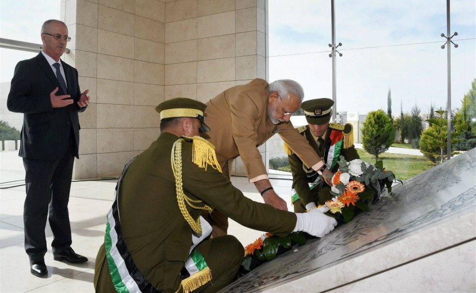 Modi began his engagement by laying a wreath at the mausoleum of iconic Palestinian leader Yasser Arafat. He was accompanied by his Palestinian counterpart Rami Hamdallah. PTI Modi began his engagement by laying a wreath at the mausoleum of iconic Palestinian leader Yasser Arafat. He was accompanied by his Palestinian counterpart Rami Hamdallah. PTI