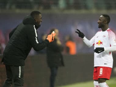 RB Leipzig’s Guinean midfielder Naby Keita celebrates with a teammate. AFP