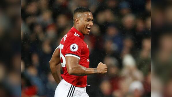 Premier League: Manchester United's Antonio Valencia says team needs to fight for title despite City's 13-point lead