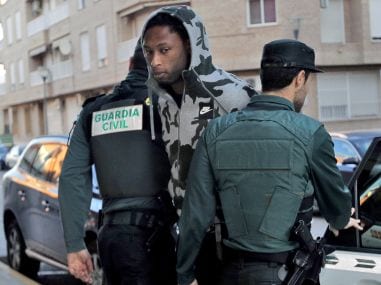 Villarreal's Ruben Semedo arrives escorted by Spanish Guardia Civil guards at the couthouse. AFP