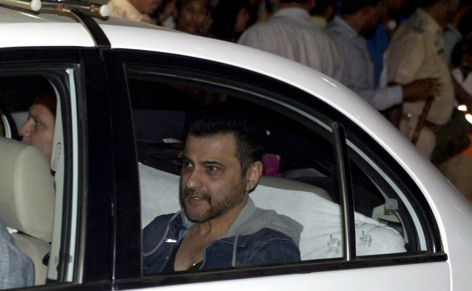 The mortal remains were then taken to the Lokhandwala house of the Kapoors where about a dozen police personnel and as many private security men were deployed for crowd management. PTI The mortal remains were then taken to the Lokhandwala house of the Kapoors where about a dozen police personnel and as many private security men were deployed for crowd management. PTI