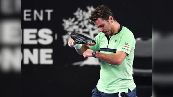 Open 13: Stan Wawrinka retires in second round after knee flares up; Nicolas Mahut upsets Gilles Muller