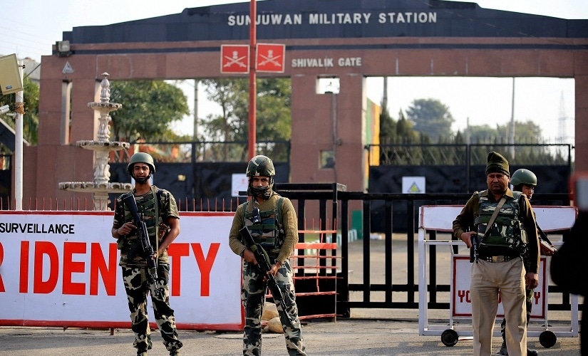 Security personnel takes positions at Sunjuwan Army camp in Jammu. PTI
