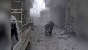 Syria bombardment kills 77 civilians in Eastern Ghouta as regime forces prepare for ground assault