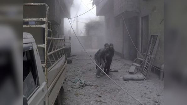 Syria bombardment kills 77 civilians in Eastern Ghouta as regime forces prepare for ground assault