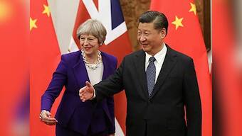 Theresa May concludes China visit with deals worth £9 billion; Xi Jinping promises to build on 'golden era' of relations