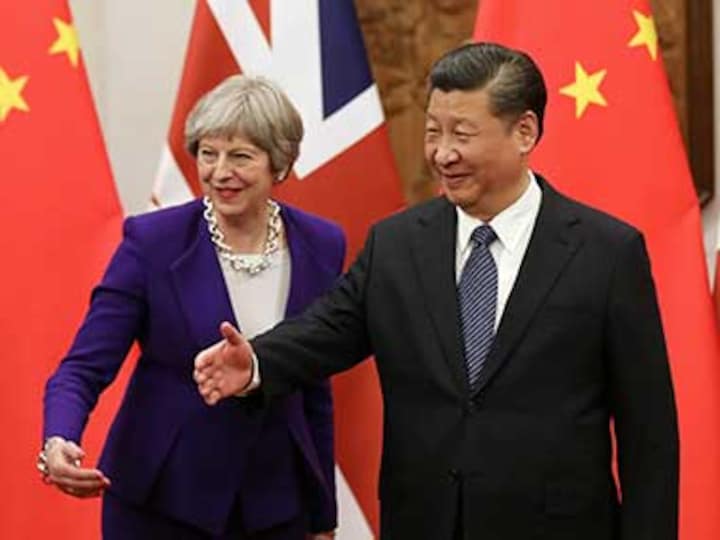 Theresa May concludes China visit with deals worth £9 billion; Xi Jinping promises to build on 'golden era' of relations