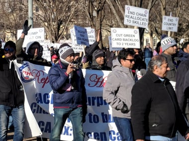 Hundred highly-skilled Indian workers hold a rally to end the per-country limit on legal permanent residency so as to eliminate the massive Green Card backlog, in front of the White House in Washington, DC on Saturday. PTI