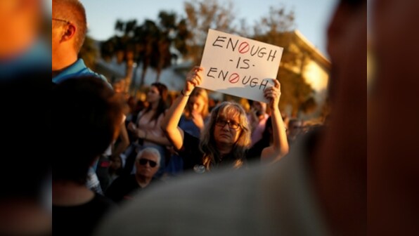 Florida shooting: Thousands attend vigil to mourn 17 victims at Marjory Stoneman Douglas High School