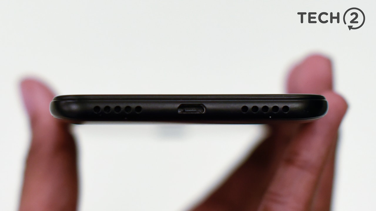 Power and connectivity is delivered via a microUSB port at the bottom. The headphone jack is at the top.