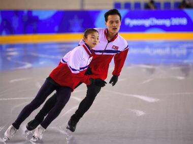 North Korean figure skaters Ryom Tae-Ok (L) and Kim Ju-Sik attend a practice session at the Gangneung Ice Arena ahead of the Winter Olympics. AFP