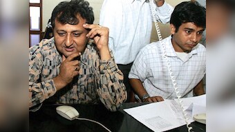 Sensex halts 3-day winning run, ends below 35,000 mark; Re depreciates 45 paise