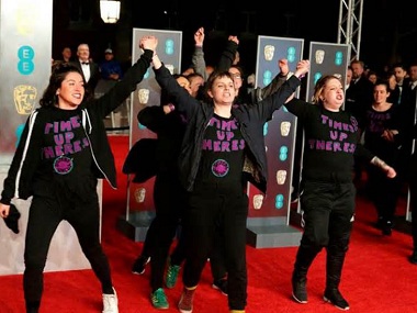 BAFTA 2018: Group of female protesters wearing 'Time's Up Theresa' T-shirts crash red carpet BAFTA 2018: Group of female protesters wearing 'Time's Up Theresa' T-shirts crash red carpet