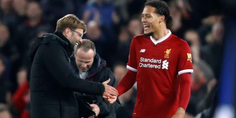 Liverpool manager Jurgen Klopp with Virgil van Dijk. Reuters 