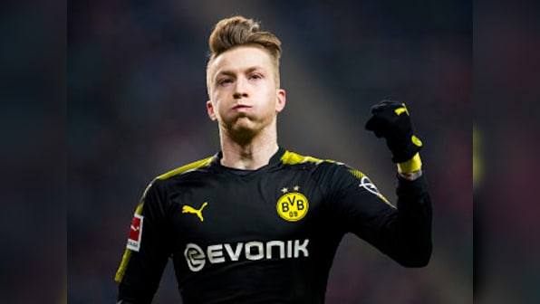 Bundesliga: Marco Reus scores again as Borussia Dortmund hold RB Leipzig; Schalke go 2nd with Hertha Berlin win