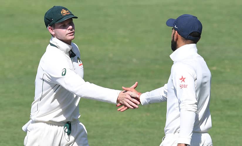 Australia’s captain Steve Smith (L) greets India’s captain Virat Kohli after winning the first cricket Test match between India and Australia at The Maharashtra Cricket Association Stadium in Pune on February 25, 2017. —-IMAGE RESTRICTED TO EDITORIAL USE - STRICTLY NO COMMERCIAL USE—– / GETTYOUT / AFP PHOTO / INDRANIL MUKHERJEE / —-IMAGE RESTRICTED TO EDITORIAL USE - STRICTLY NO COMMERCIAL USE—– / GETTYOUT