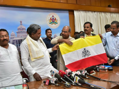 Yellow, white and red: New Karnataka flag featuring state emblem unveiled by Siddaramaiah, awaits MHA approval Yellow, white and red: New Karnataka flag featuring state emblem unveiled by Siddaramaiah, awaits MHA approval