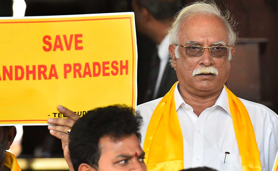 The protests come after two TDP ministers had submitted their resignations to Prime Minister Narendra Modi, saying that they will continue to be a part of NDA but would no longer hold ministerial positions. Ashok Gajapathi Raju at the protests outside Parliament House. PTI The protests come after two TDP ministers had submitted their resignations to Prime Minister Narendra Modi, saying that they will continue to be a part of NDA but would no longer hold ministerial positions. Ashok Gajapathi Raju at the protests outside Parliament House. PTI