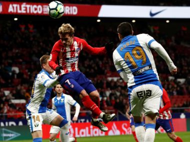 Atletico Madrids Antoine Griezmann scores their third goal against Leganes. Reuters