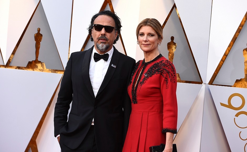 Alejandro Gonzalez Inarritu, left, and Maria Eladia Hagerman arrive at the Oscars on Sunday, 4 March 2018, at the Dolby Theatre in Los Angeles. AP Photo