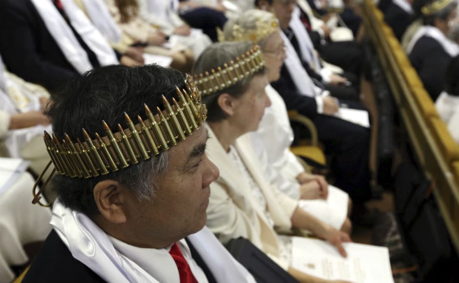 Some worshippers also wore crowns made out of bullets. Tim Elder, Unification Sanctuary's director of world missions, said the ceremony was meant to be a blessing of couples, not inanimate objects, calling the AR-15 a religious accouterment. AP Some worshippers also wore crowns made out of bullets. Tim Elder, Unification Sanctuary's director of world missions, said the ceremony was meant to be a blessing of couples, not inanimate objects, calling the AR-15 a religious accouterment. AP