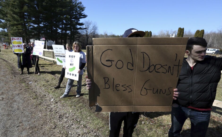 A large number of people held protest outside the church calling the group an armed religious cult. The event also promoted the district administration to move students of elementary school to other campuses. AP A large number of people held protest outside the church calling the group an armed religious cult. The event also promoted the district administration to move students of elementary school to other campuses. AP