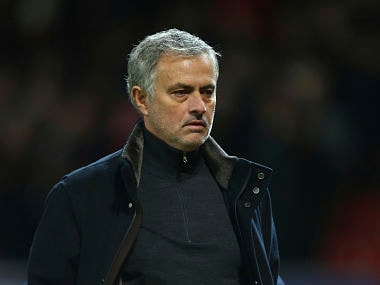 Manchester United head coach Jose Mourinho walks from the pitch after the end of the Champions League round of 16 second leg soccer match between Manchester United and Sevilla, at Old Trafford in Manchester, England, Tuesday, March 13, 2018. Sevilla won the game 2-1 and go through to the quarterfinals .(AP Photo/Dave Thompson)